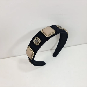 Vintage velvet headband featuring square diamantes and grey gemstones in a retro style