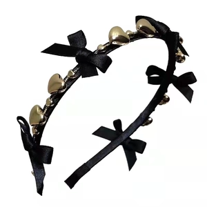 Serre-tête élégant à nœuds noirs et cœurs dorés pour accessoire cheveux femme