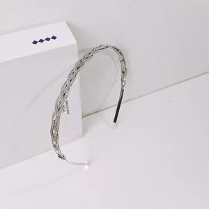 Classic silver woven alloy headband for women with a vintage French braided metal design
