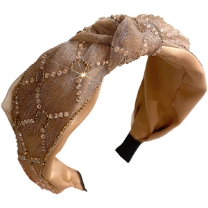 Vintage champagne gold rhinestone headband with twisted mesh design and crystals