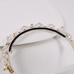 Close-up of crystal beaded headband with non-slip inner teeth and silver wire detail