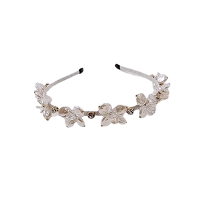 Elegante cerchietto sottile con fiori in madreperla bianca e accenti di cristalli