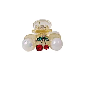 French vintage yellow acrylic hair claw clip with red cherry and pearl embellishments