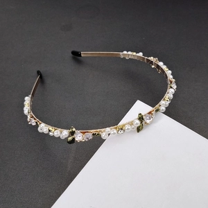 Elegant gold metal headband with pearls and green enamel flowers for women