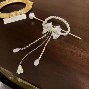 Elegant vintage hair stick with gold bow, long pearl tassels and white flower decoration