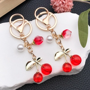 Korean Creative Resin Simulated Fruit Cherry Peach Artificial Pearl Keychain Zinc Alloy Gold Leaf Bag Pendant Jewelry For Women