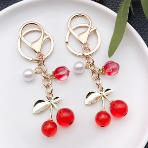 Creative resin cherry fruit keychain set with red transparent beads and pearl detail