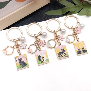 Lot de porte-clés chat tarot rose avec motifs chat noir et breloques fleurs de cerisier
