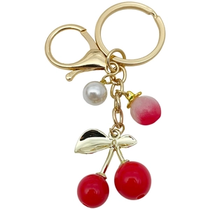Charming fruit keychain with red cherries, pink berry and white pearl on gold ring