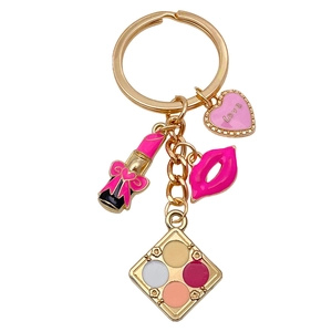 Golden keychain with pink lipstick, heart love charm, lips, and makeup palette pendant