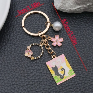Porte-clés chat cœur rose et guirlande avec pendentif carte The Lovers et perle