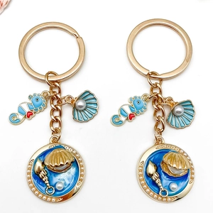 Porte-Clés en Métal Thème Océan Hippocampe Conque Sirène Tortue Alliage d'Or Pendentif de Sac pour Femme Bijoux Cadeau