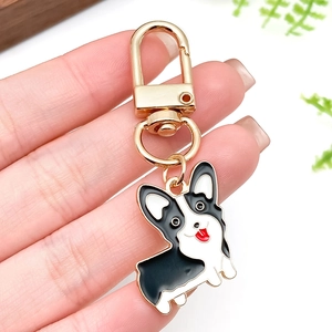 Cute black and white Corgi enamel keychain with gold lobster clasp for bags and keys