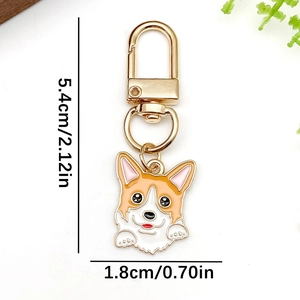 Cute enamel Corgi dog keychain in orange and white with a gold-plated D-ring hook