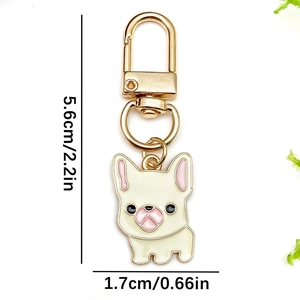 Cute French Bulldog enamel keychain with golden metal clasp and white dog charm