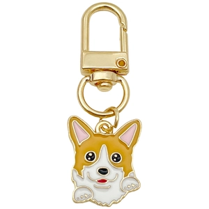 Cute cartoon Corgi zinc alloy keychain with yellow and white enamel finish on white background