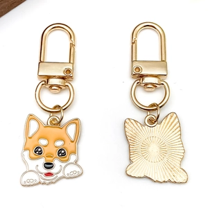 Cute Corgi dog enamel keychain with orange and white finish and gold plating