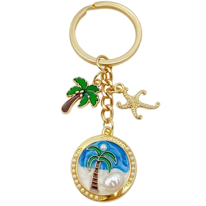 Porte-clés océan doré avec étoile de mer, palmier et pendentif vague perle pour plage