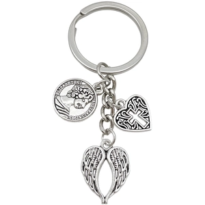 Silver alloy keychain with Queen Elizabeth coin, heart cross, and angel wings charms