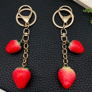 Creative strawberry keychain with gold rings and realistic resin red fruit charms