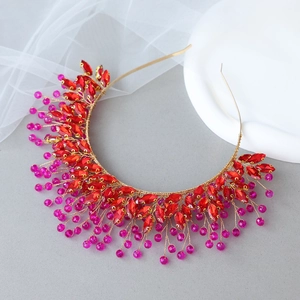 Detail of handmade gold wire bridal headband with red marquise crystals and purple beads
