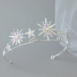 Silver bridal headband with AB rhinestones and star motifs shown from a 45-degree angle