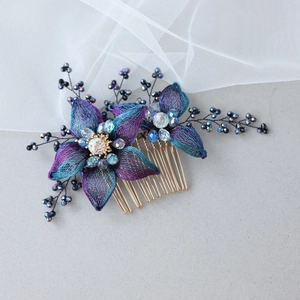 Elegant handmade floral hair comb with purple and teal mesh petals and crystal beads