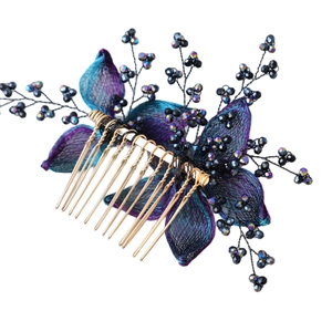 Elegant handmade floral hair comb with blue-purple mesh petals and iridescent black beads
