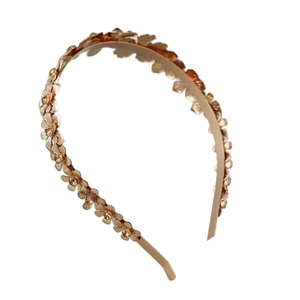 Golden flower metal headband with sparkling crystals for elegant bridal hair styling