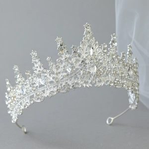 Close-up of bridal tiara with rhinestones and silver alloy plating on white veil