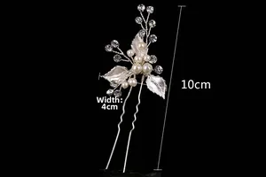 Detail view of handmade bridal hair pin with silver leaves, pearls, and crystals, 10x4cm size