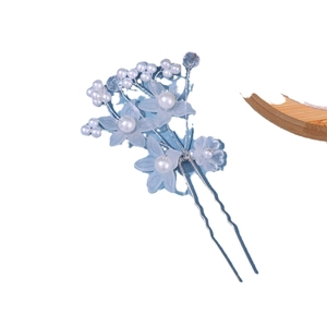 Elegant bridal hair pin with light blue matte flowers and white beads on silver metal
