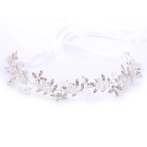 Elegant bridal crystal headband with silver leaves, rhinestones and white silk ribbon