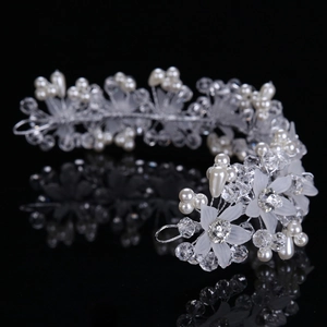 Handmade bridal headband with crystal flowers and white pearls on silver wire