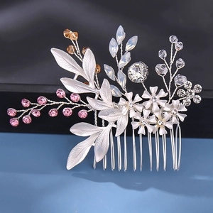 Exquisite bridal hair comb with silver leaves, pink crystals, and amber stones for wedding