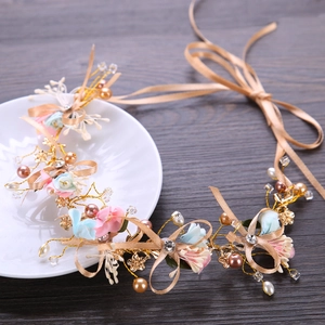 Handmade floral bridal crown with pink blue silk flowers and elegant champagne ribbon