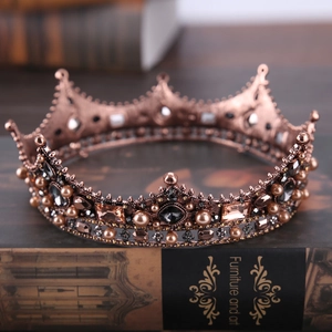 Detailed view of Baroque crown with vintage bronze alloy and amber crystal accents