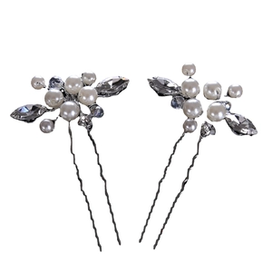 Elegant pair of silver bridal hair pins with white pearls and sparkling rhinestones