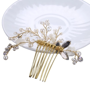 Handmade bridal hair comb with gold floral motifs, white pearls and sparkling crystals