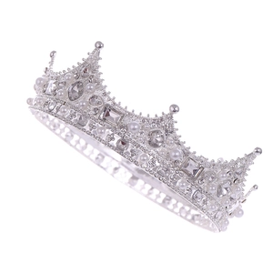 Elegant silver Baroque crown with sparkling crystals and white pearls for weddings