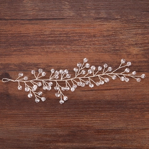 Silver crystal hair vine bridal headpiece with handmade beaded floral branch design