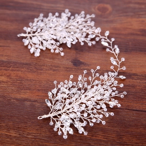 Elegant bridal hair vine with silver crystals and rhinestones for wedding hairstyles