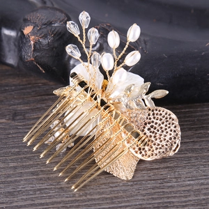 Exquisite golden leaf hair comb with white shell flowers and pearls for bridal styling