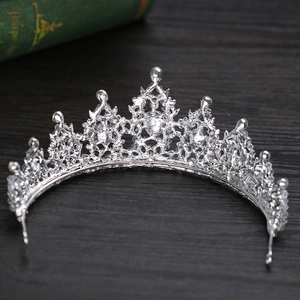 Detail view of the intricate silver alloy structure and rhinestone inlay on the bridal crown