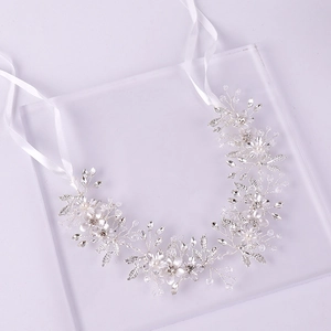 Silver leaf bridal headband with handmade white flowers and satin ribbon ties