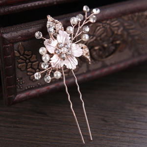 Elegante forcina sposa con fiore oro rosa, perle e cristalli su base in legno