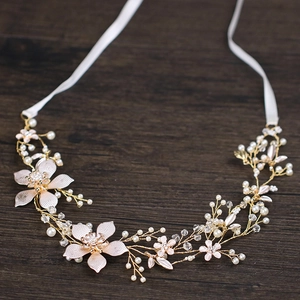 Elegante fascia per capelli da sposa con perle fatte a mano e foglie di cristallo su legno