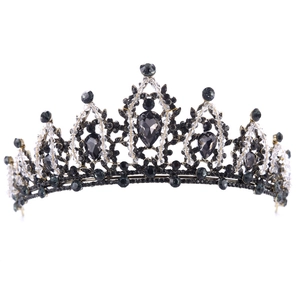 Gothic vintage black rhinestone bridal tiara with intricate vine hollow design on white base