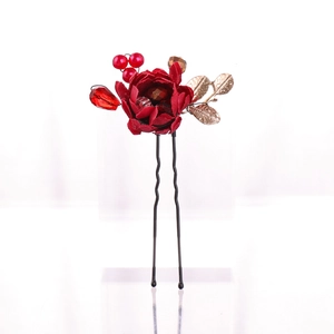 Elegant red fabric flower hair pin with golden leaves and red beads for formal events