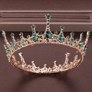 Vintage gold crown featuring emerald green rhinestones for bridal wedding accessories